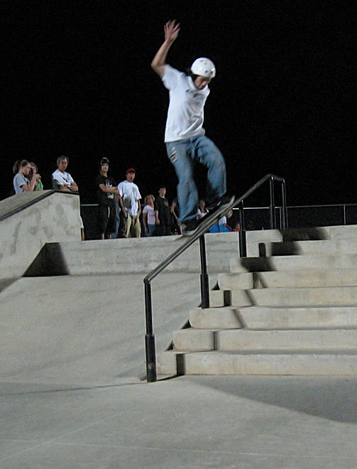 Bryan Park pops into a frontside smith down the rail